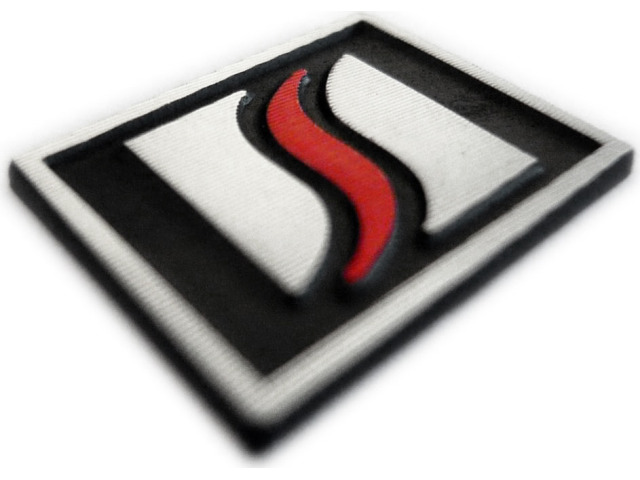 Logo Luxyline in alluminio per volante